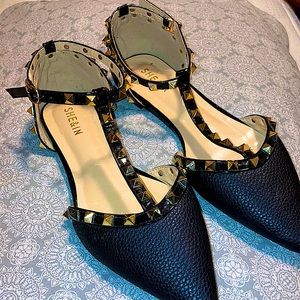 Black studded pointed toe flats
